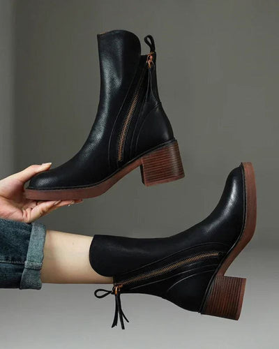Doreen™ | Black leather boots with a comfortable heel, elegant and timeless