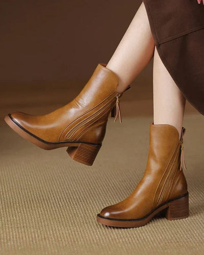 Doreen™ | Black leather boots with a comfortable heel, elegant and timeless